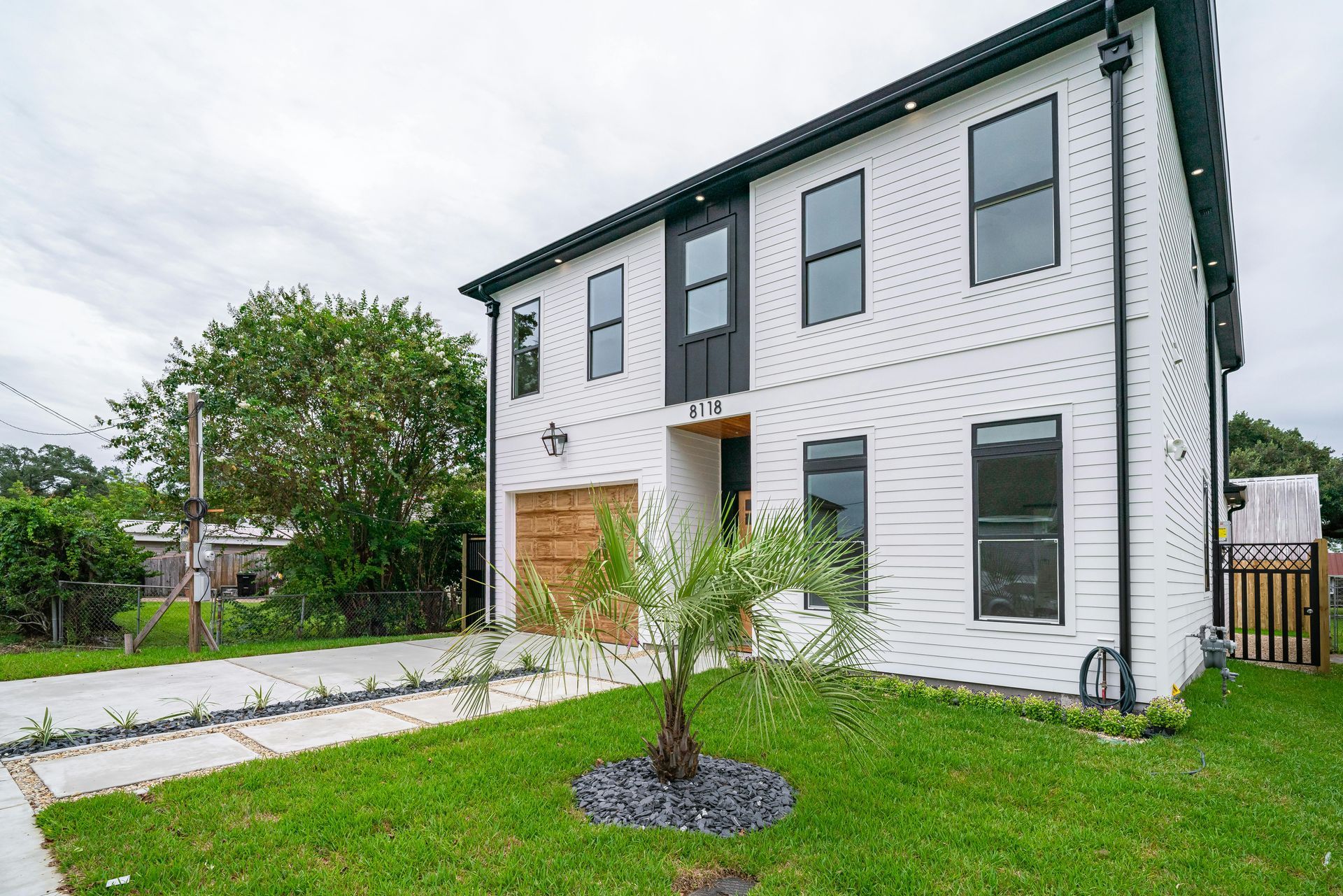 A House With a Wooden Siding on the Side of It — Karlene's Conveyancing In Erina, NSW
