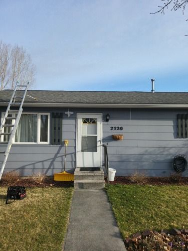 A house with a ladder on the front of it