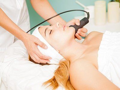 Skin Care Specialist — Woman Undergo Facial Treatment in Washington, DC