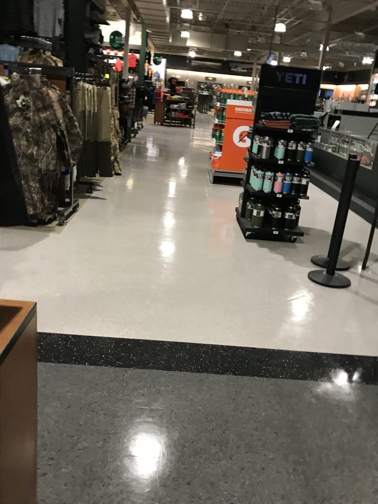 The inside of a store with a gatorade display