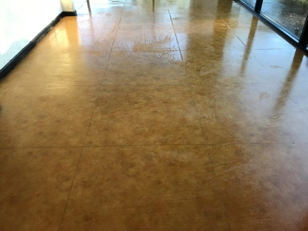 A close up of a tiled floor in a room.