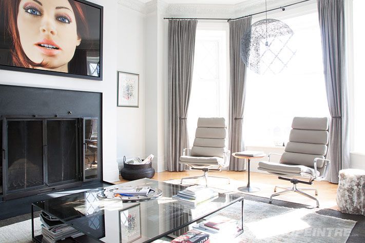 Salon avec cheminée et télé, peinture intérieure professionnelle par Propeintre