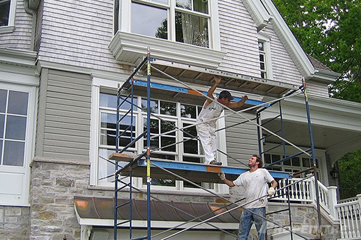 Dernière retouche de peinture extérieure par Propeintre en façade arrière