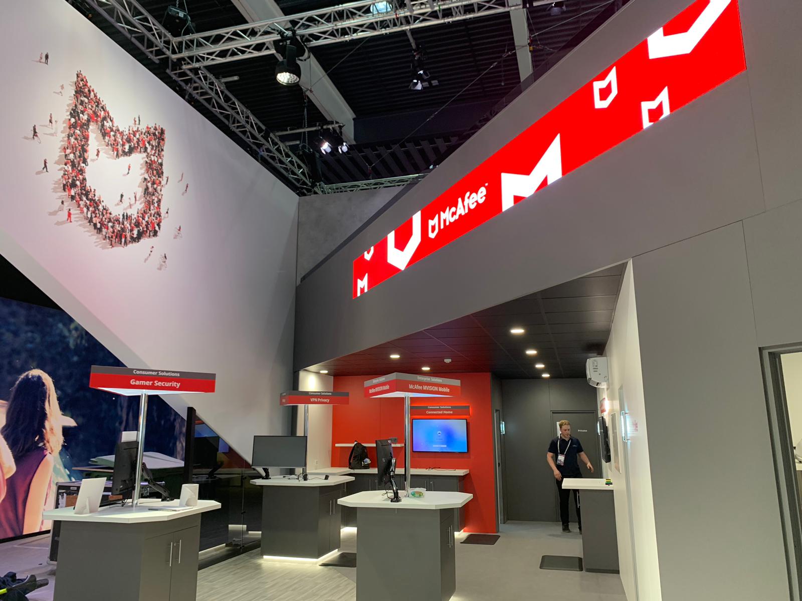 A large room with a red sign that says ' u mobile ' on it