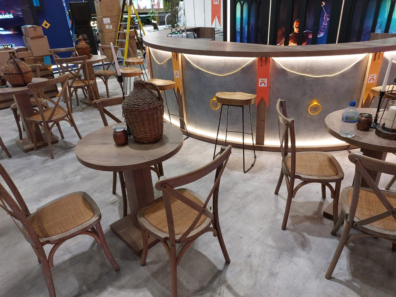 A restaurant with tables and chairs and a bar