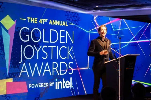 A man is giving a speech at the golden joystick awards