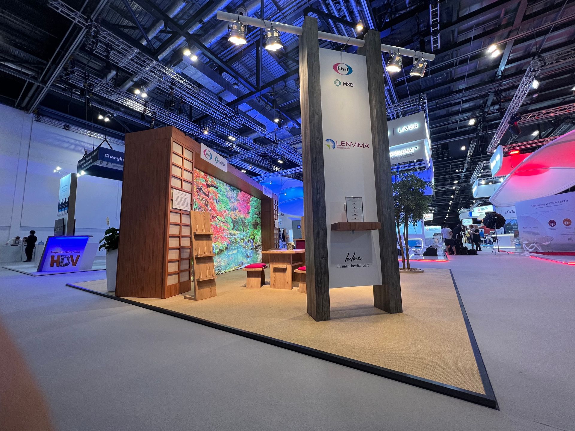 A large room with a lot of tables and chairs in it