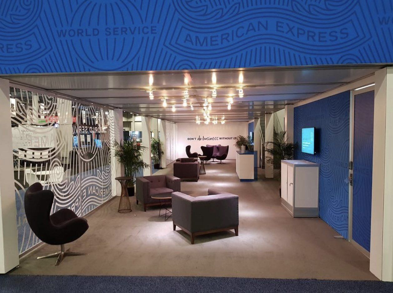 A room with a sign that says american express on it