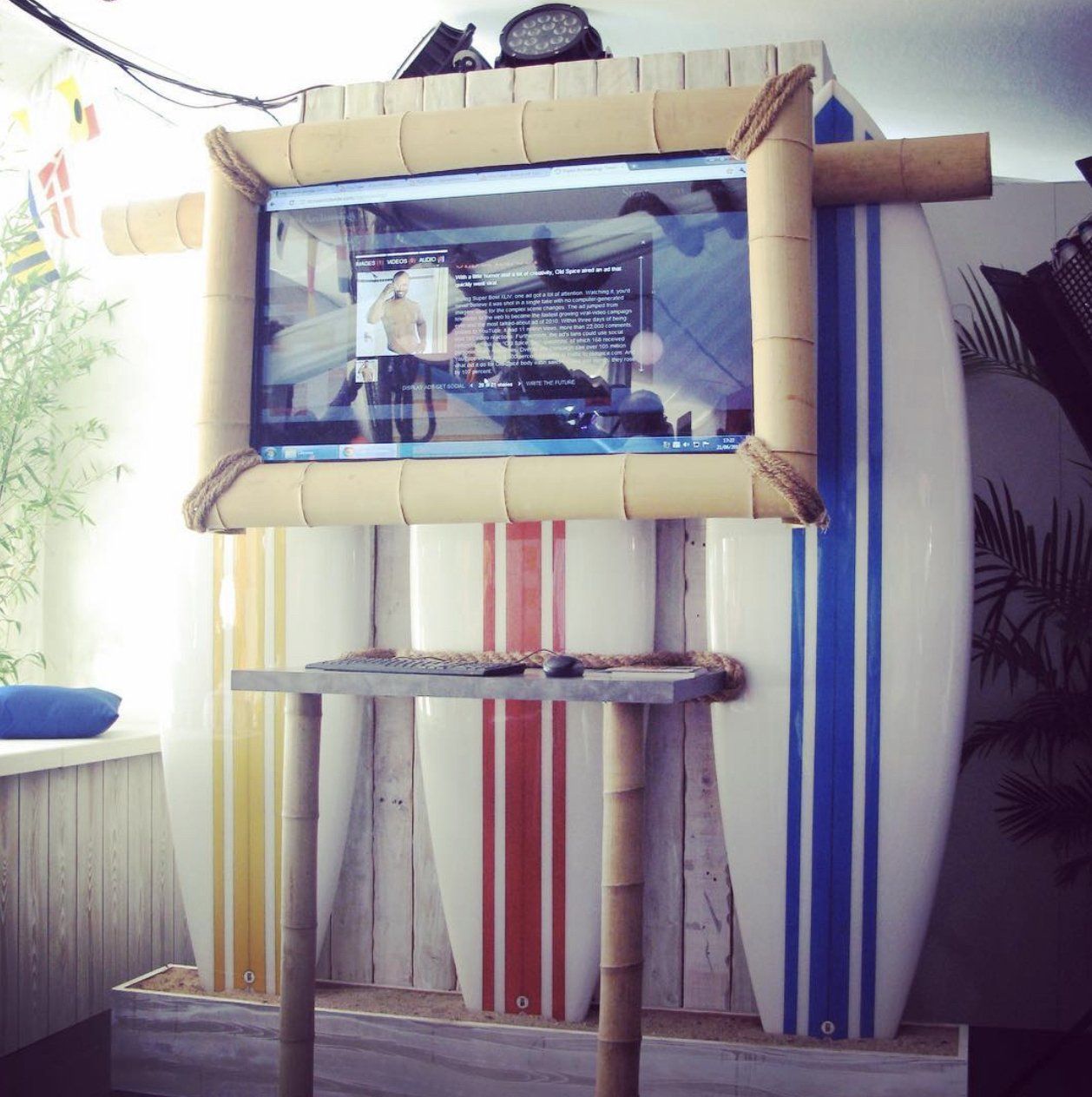 A surfboard with a tv on top of it