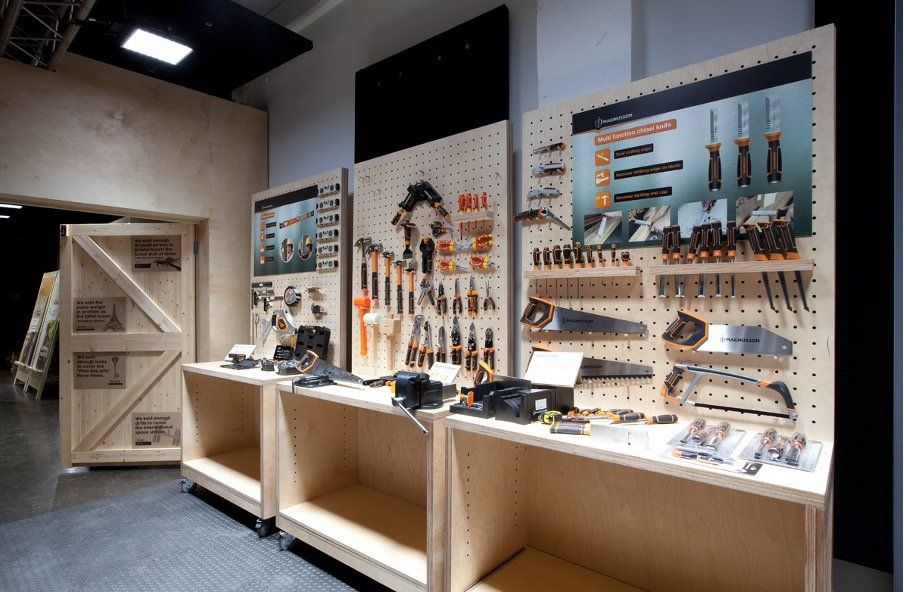 A room with a lot of tools on the wall