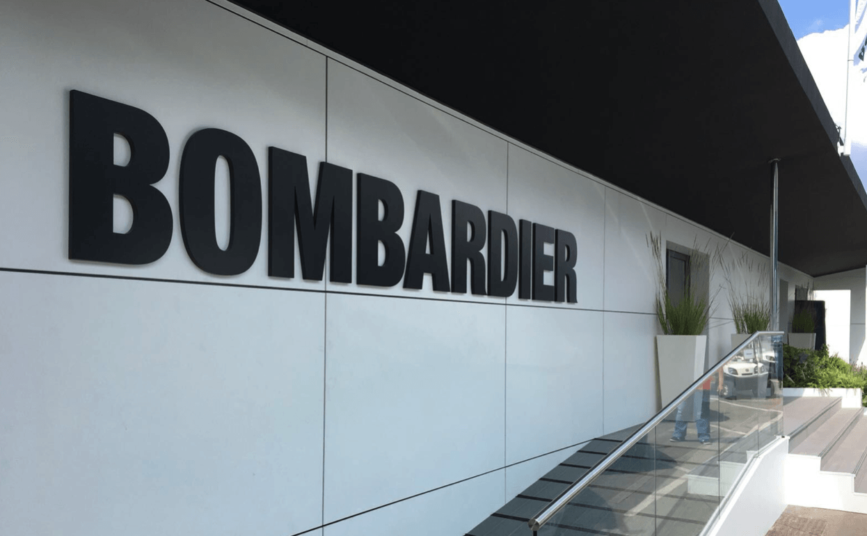 A white building with the word bombardier on it
