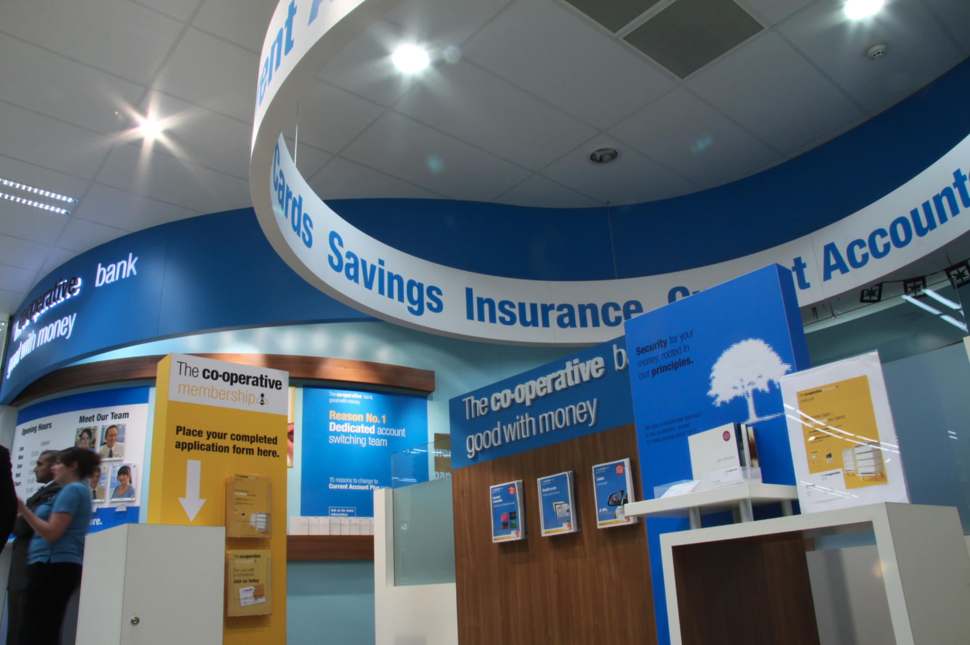 A bank with a sign that says savings insurance
