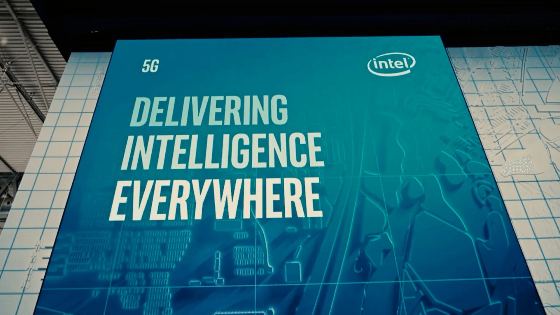 A blue sign that says delivering intelligence everywhere