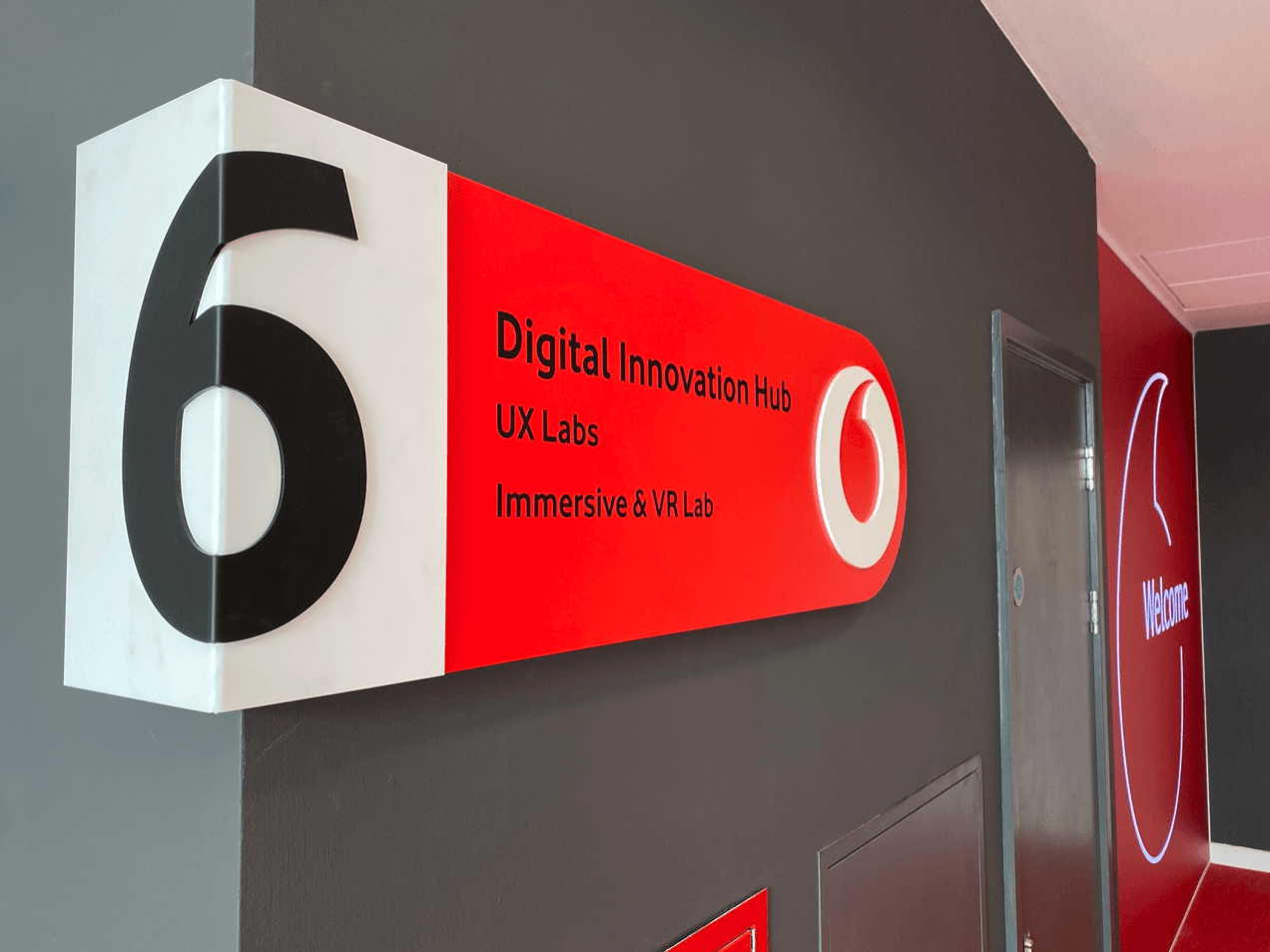 A red and white sign with the number 6 on it
