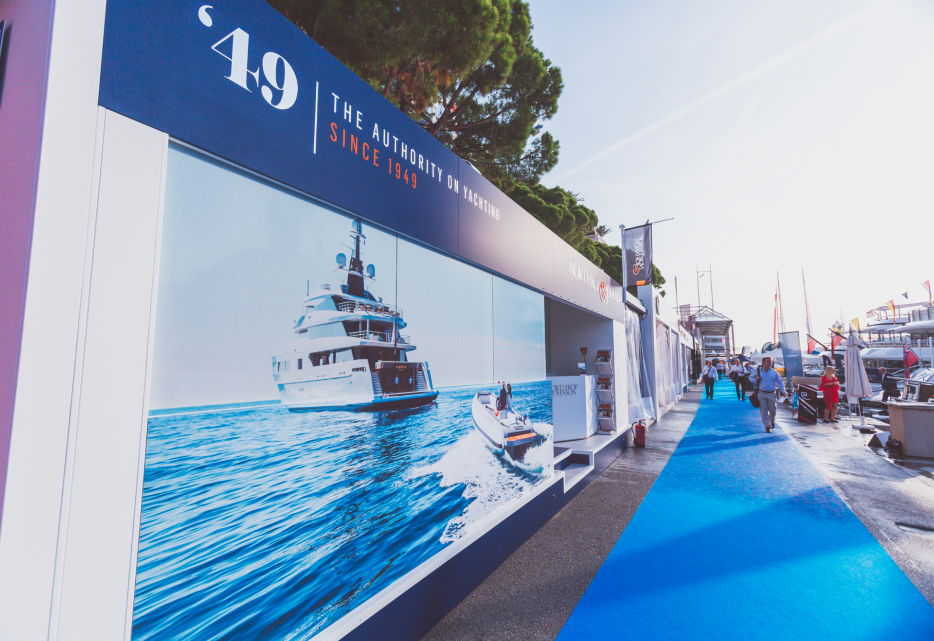 A wall with a picture of a boat and the year '19 on it
