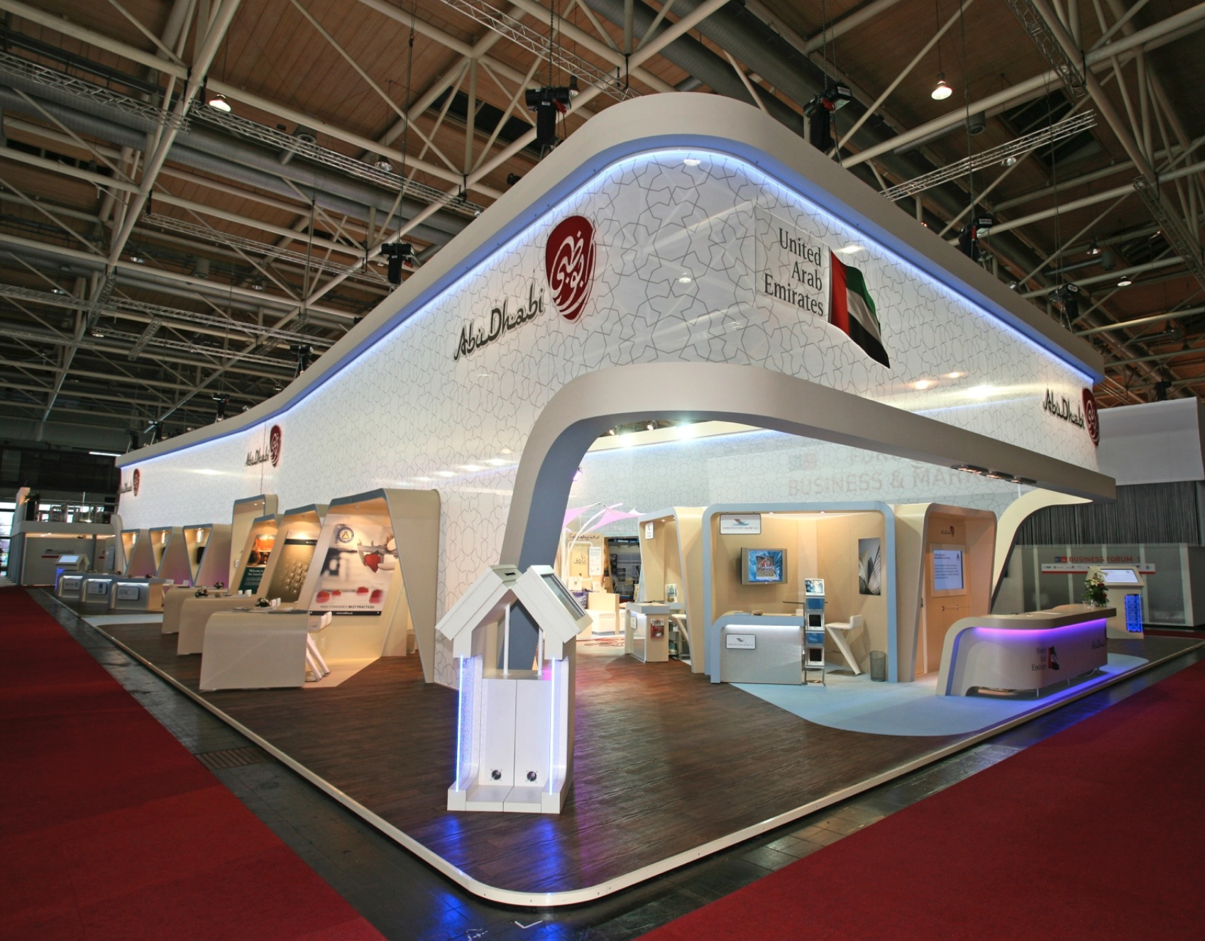 A large building with a sign that says ' dubai ' on it
