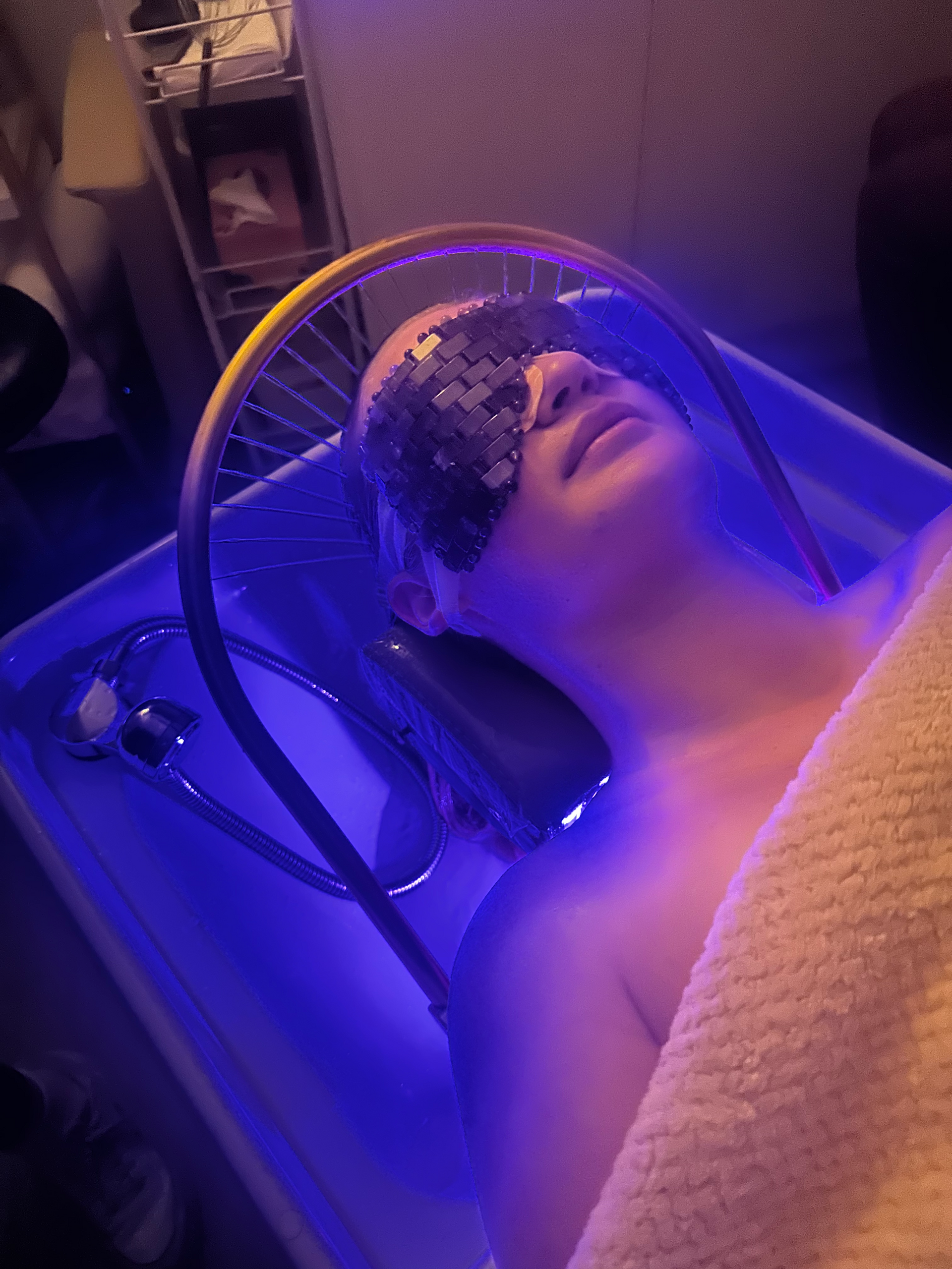 A Woman Is Getting a Japanese Head massage at A Spa — Figtree Day Spa in Sawtell, NSW