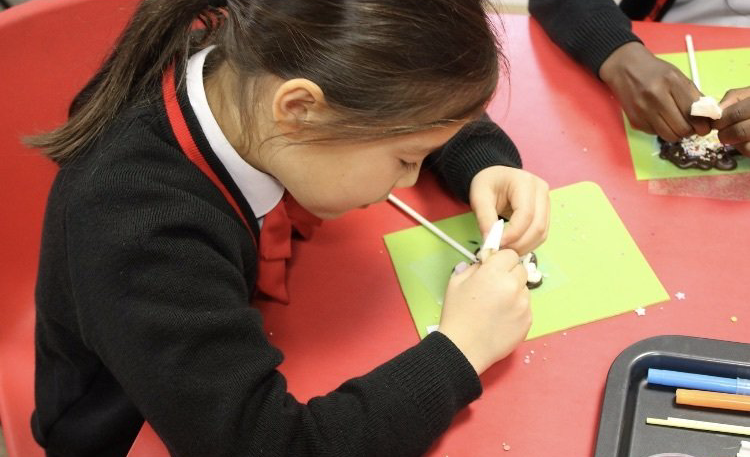 girl checking chocolate