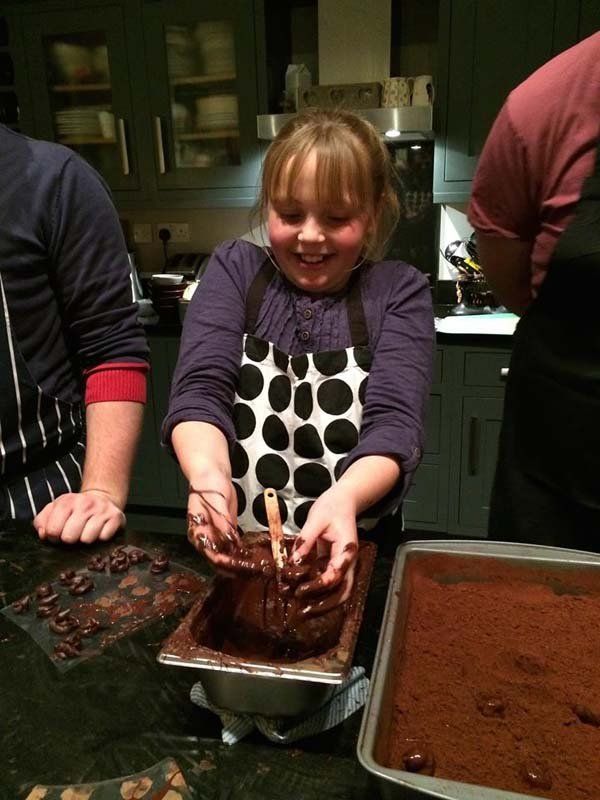 girl with chocolates on her hand