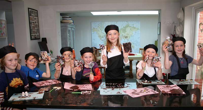 kids making chocolates