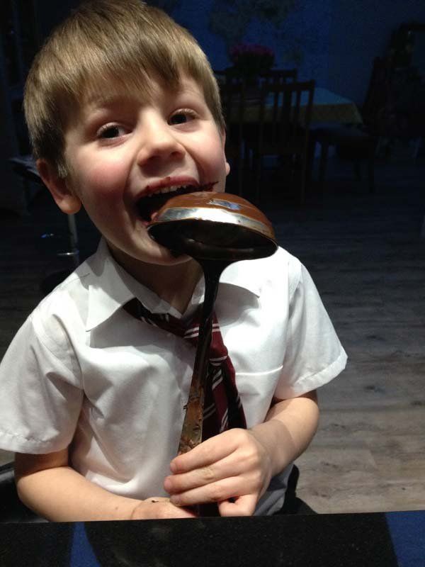 boy eating chocolate