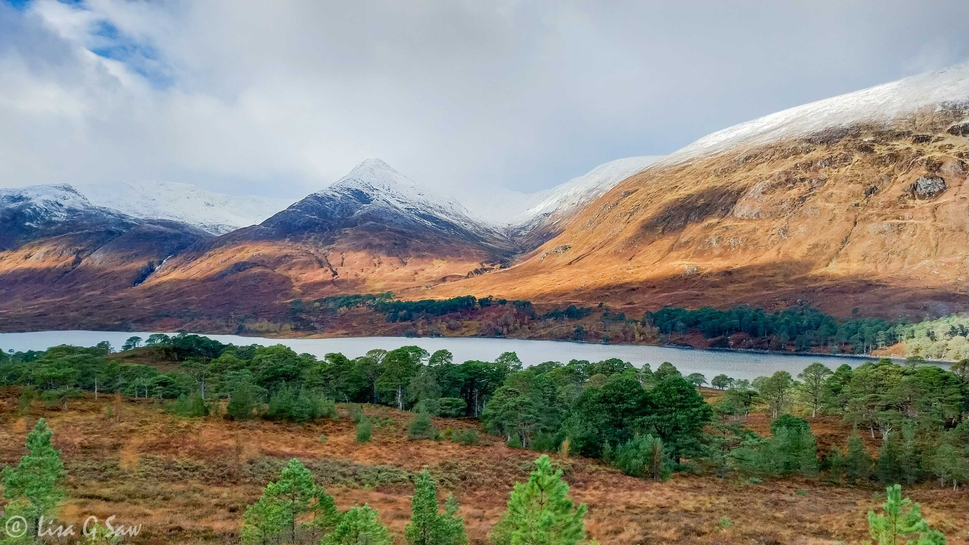 Snow capped mountains overlooking Glen Affric