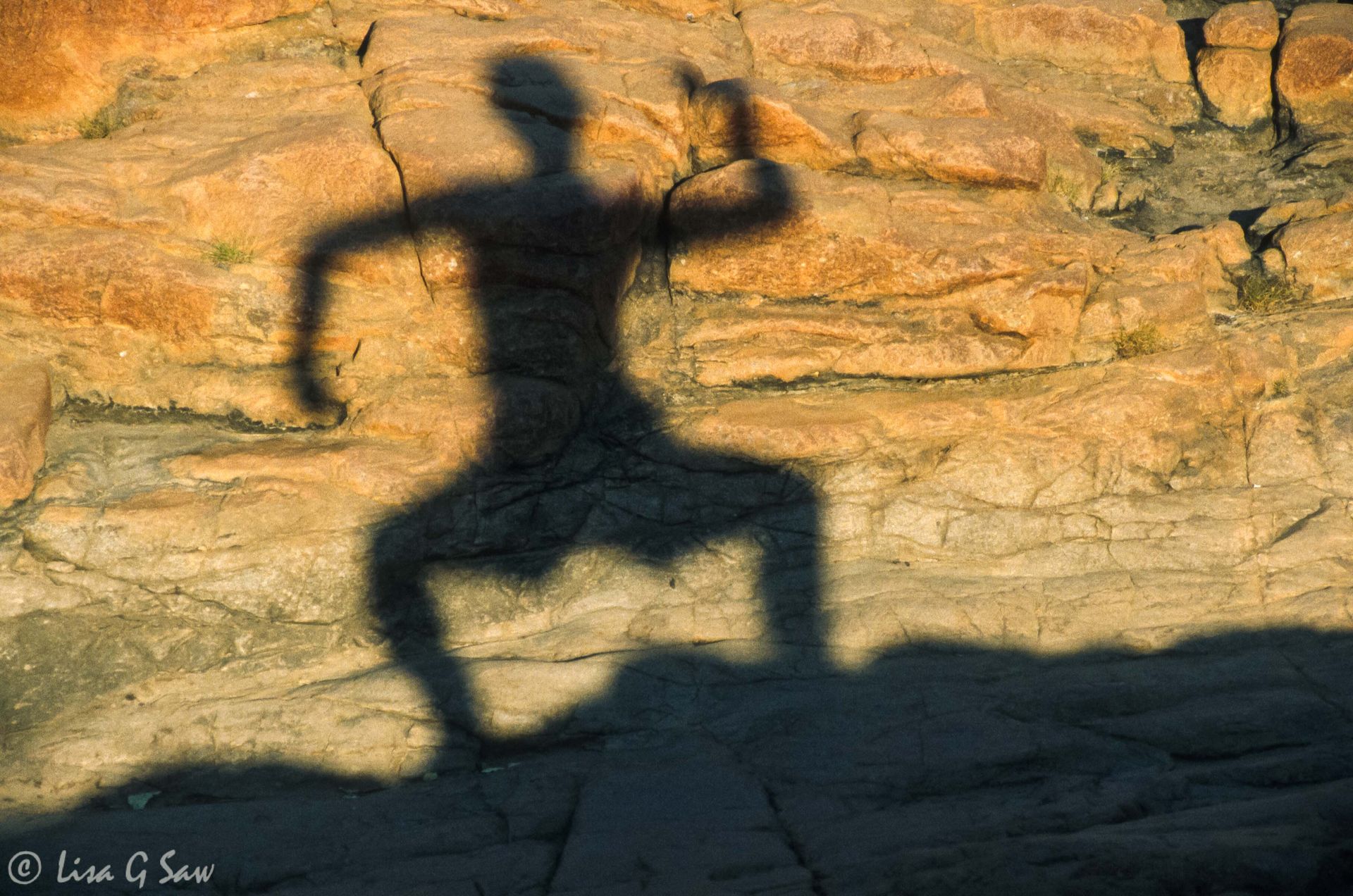 A warrior pose, shadow against the rock, Edith Falls, Northern Territory