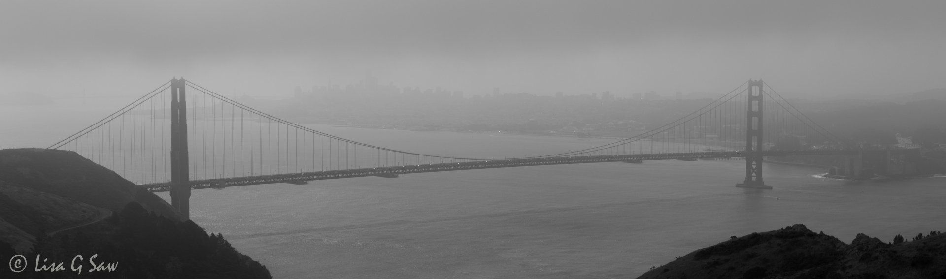 Golden Gate Bridge and city beyond in mist (black and white) (black and white)
