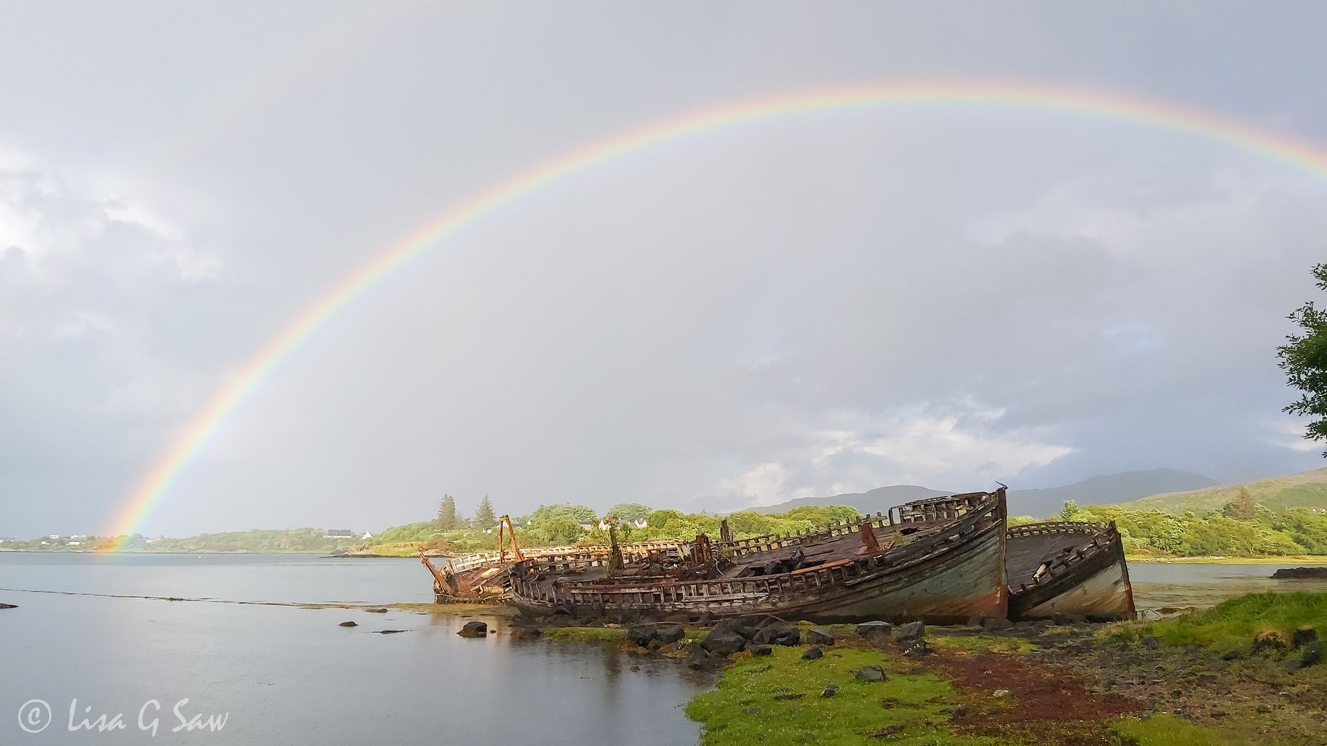 Rainbow over ship wrecks at Salen