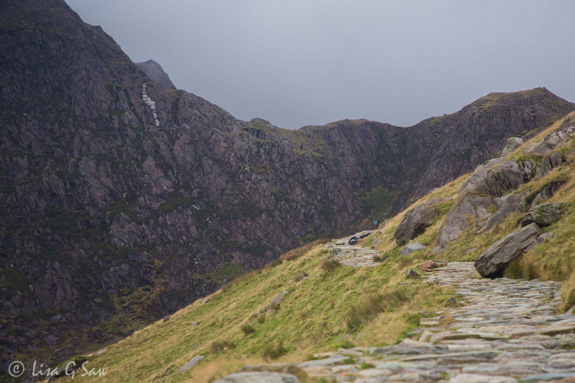 Stone path up mountains along Miners Track, Snowdonia National Park