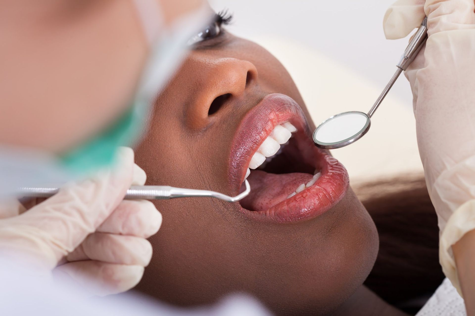 woman receiving dental cleanings, general dentistry