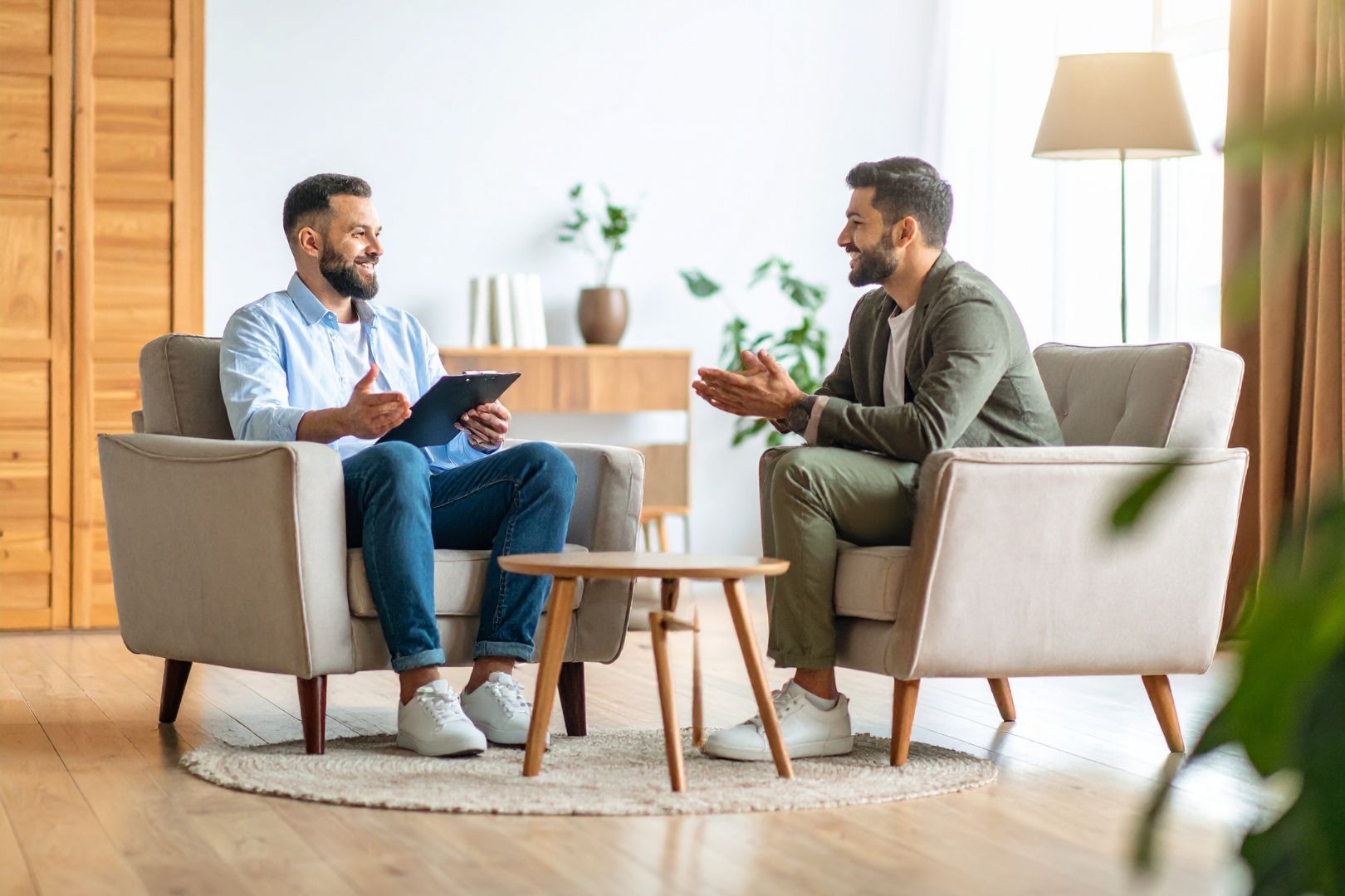 Therapist Consulting with Patient in Office