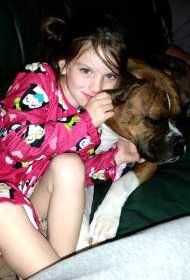 Boxer dog with young child