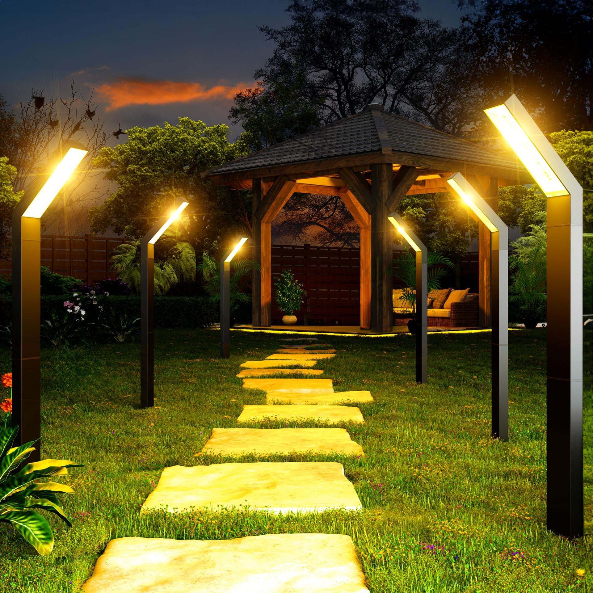 Pathway illuminated by modern lights, leading to a gazebo, at dusk.