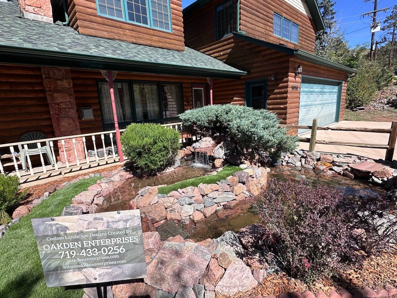 A house with a sign in front of it that says 