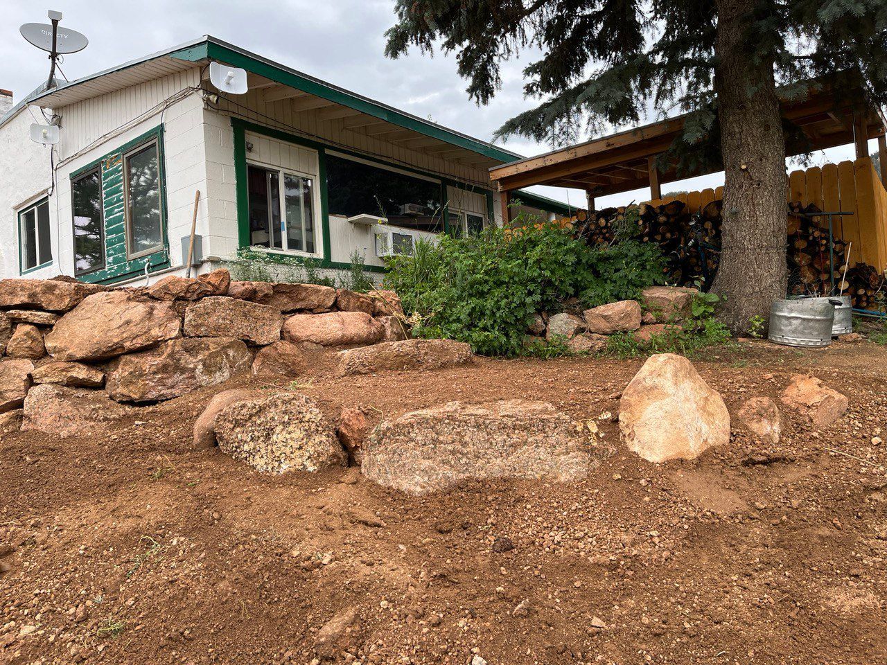 A house with a satellite dish on the side of it