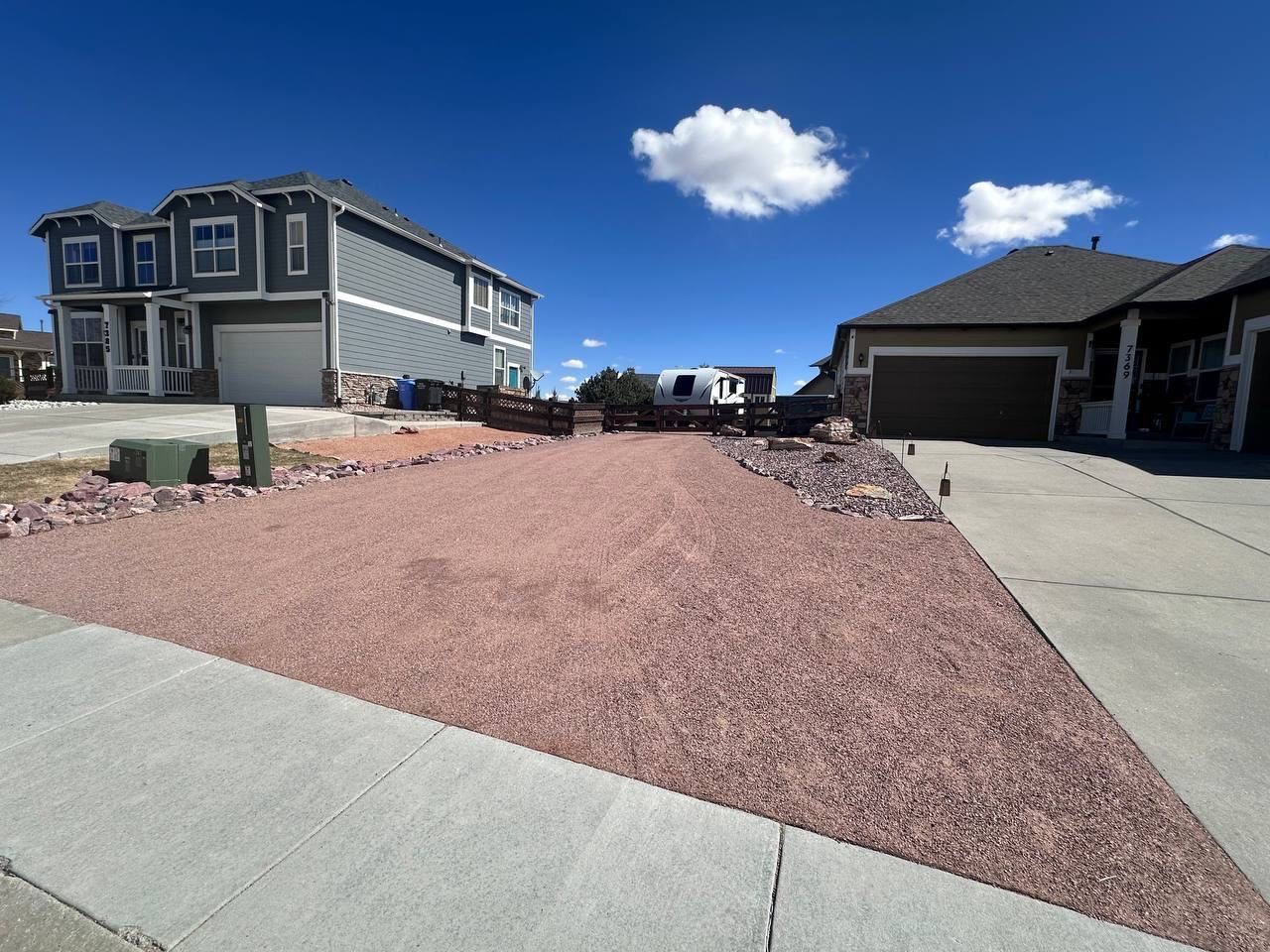 A house with a mailbox in front of it