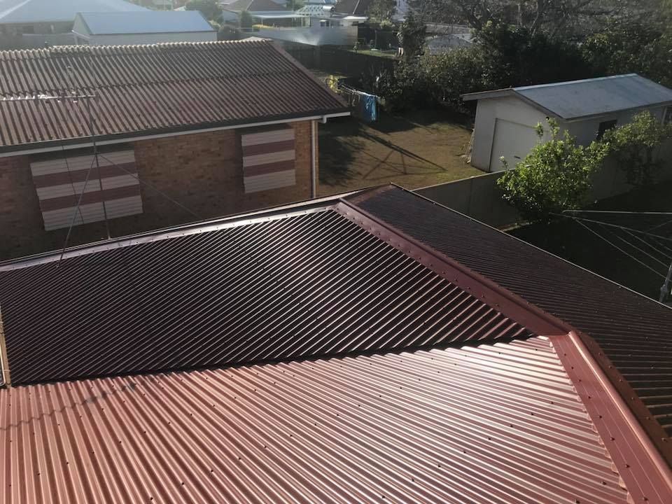 An Overhead View of Corrugated Metal Roofs — Kaplan Roofing in Walkervale, QLD