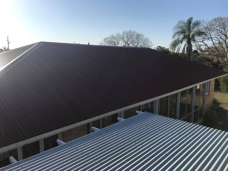 A Corrugated Metal Roof on A Building — Kaplan Roofing in Walkervale, QLD