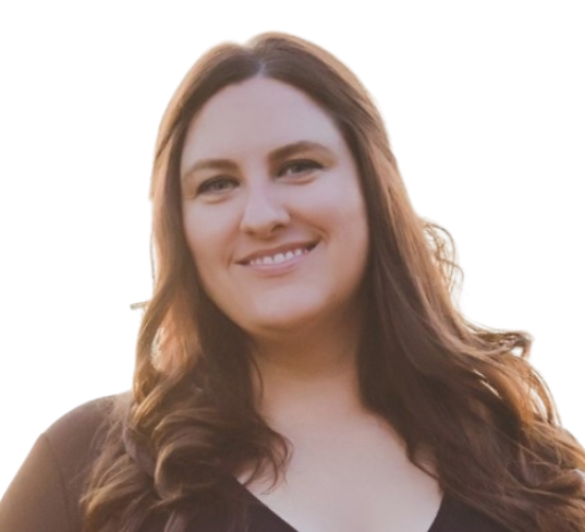 A woman with long brown hair is smiling for the camera