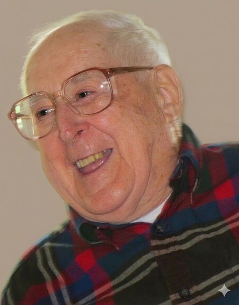 The man is wearing a plaid shirt and a white hat.