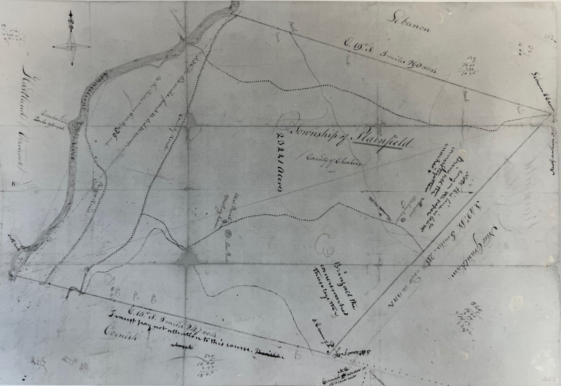 A black and white map shows a river and a riverbank