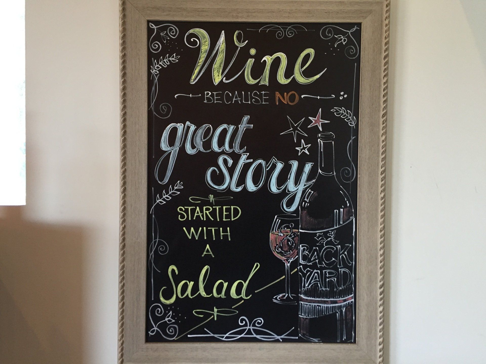 Chalkboard sign with the words 