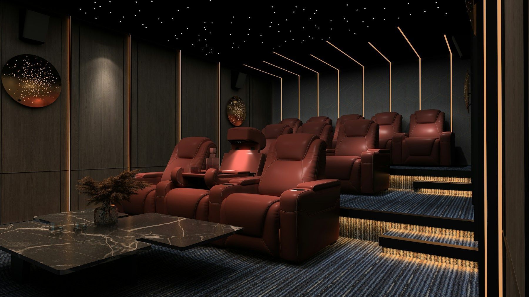 Luxury movie theater with red recliner seats, starry ceiling, and dark walls