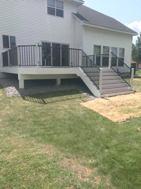 Composite Brown Deck with Black Railings – Minneapolis, MN – Pink Construction LLC