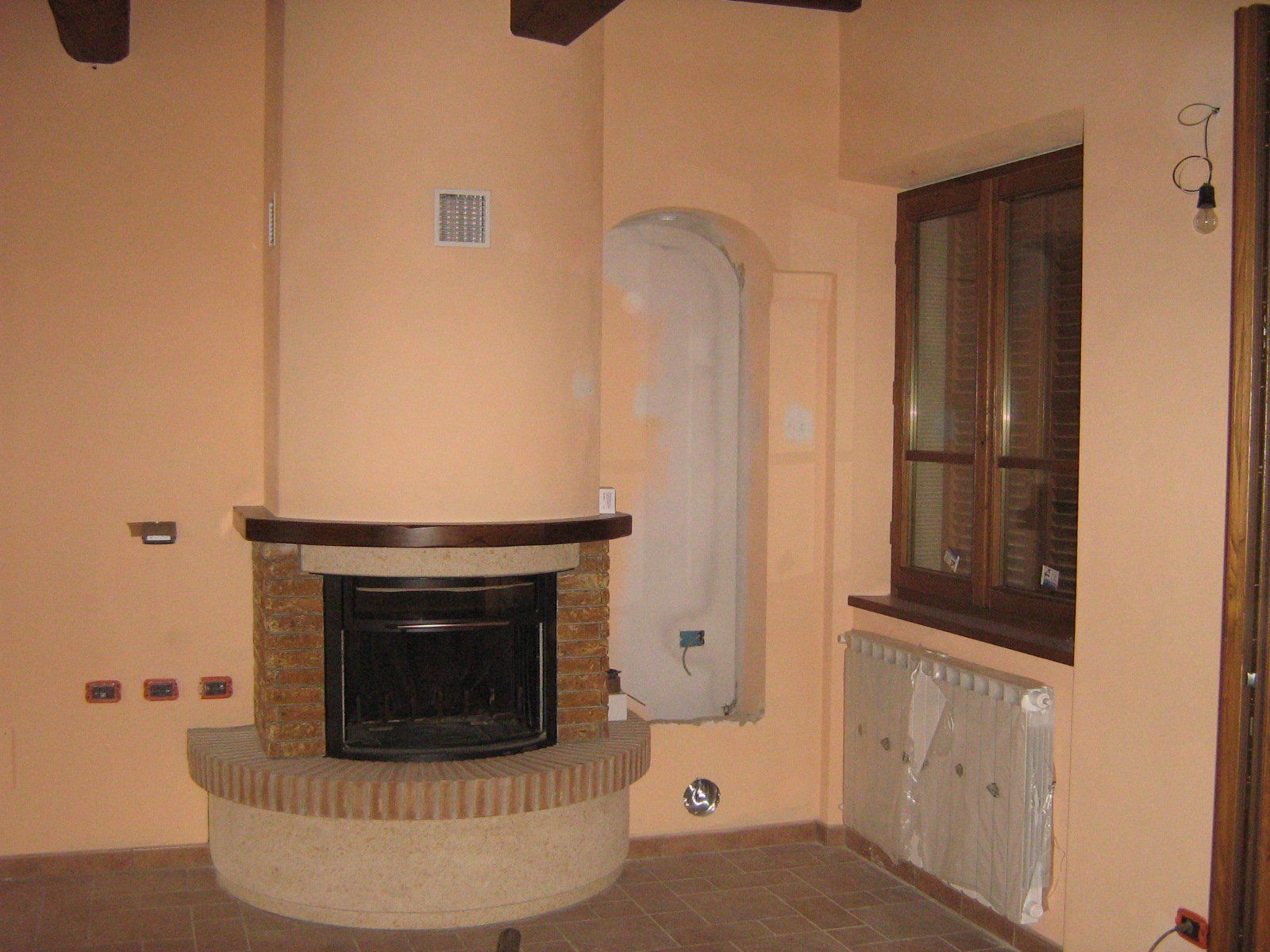 Ristrutturazione di un appartamento con camino