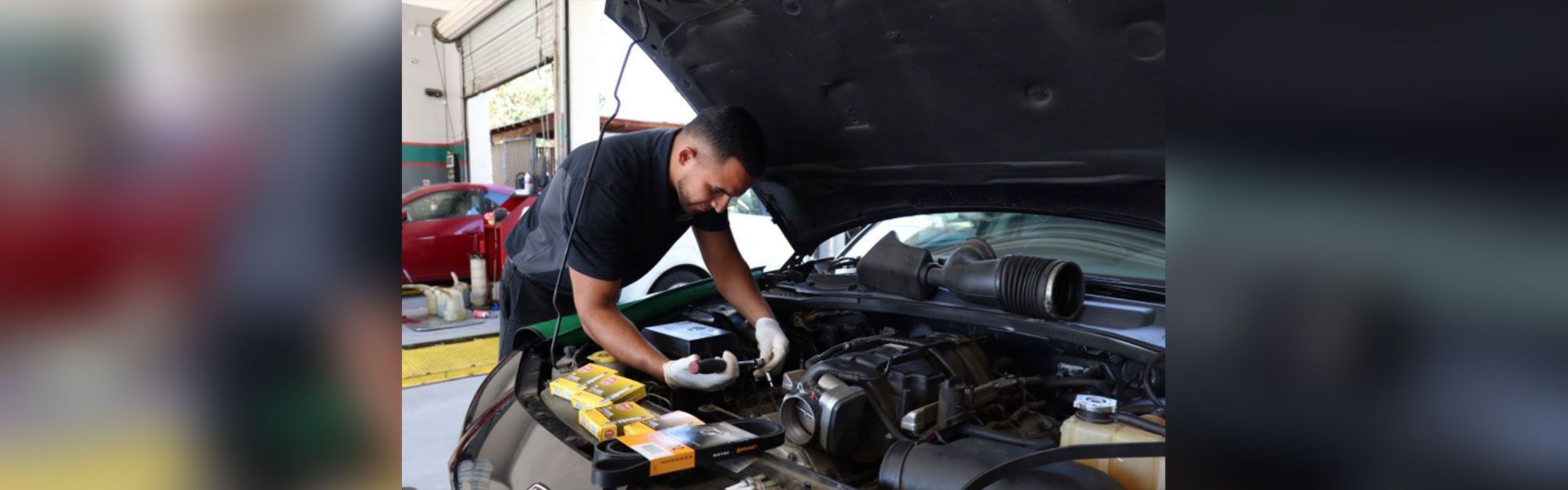 Mechanic working on car engine | Rancho Express Lube