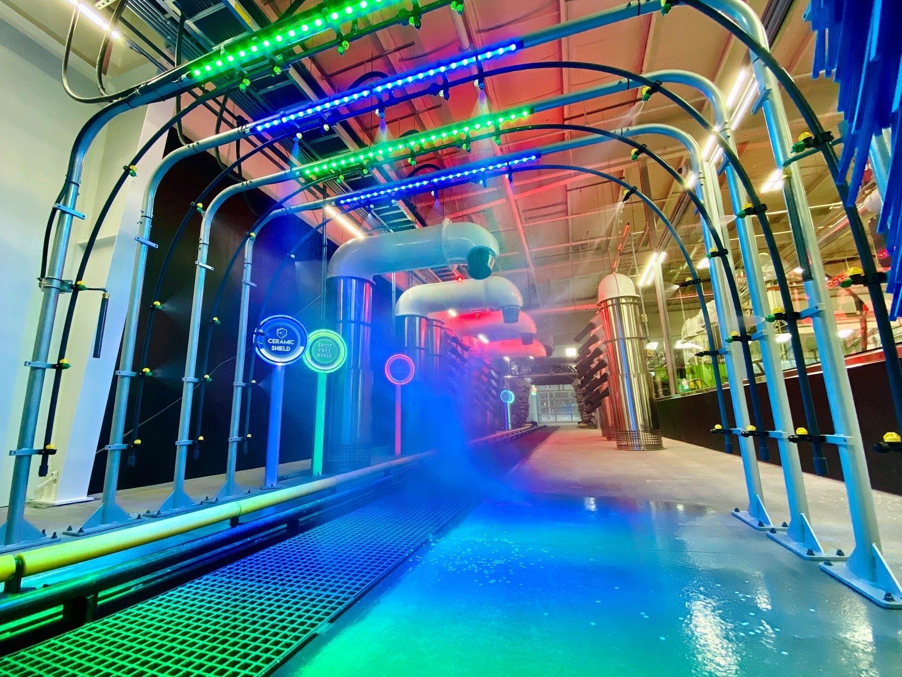 car wash arches spraying water