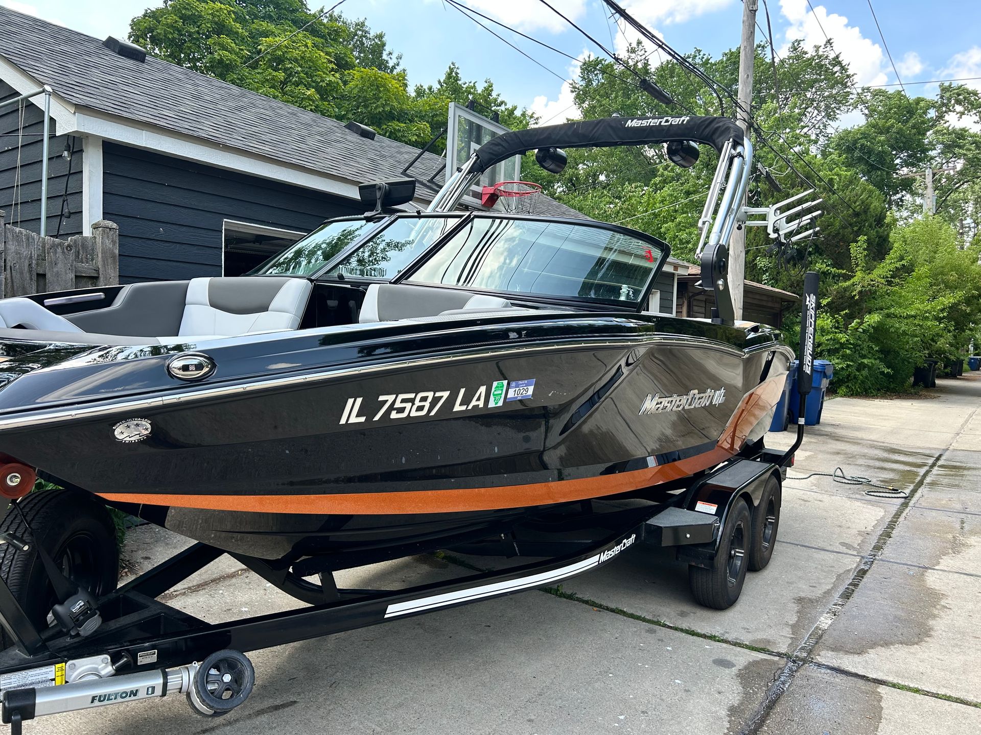 Captain Coles Detailing shop bay in Antioch IL with boat detailing in progress.