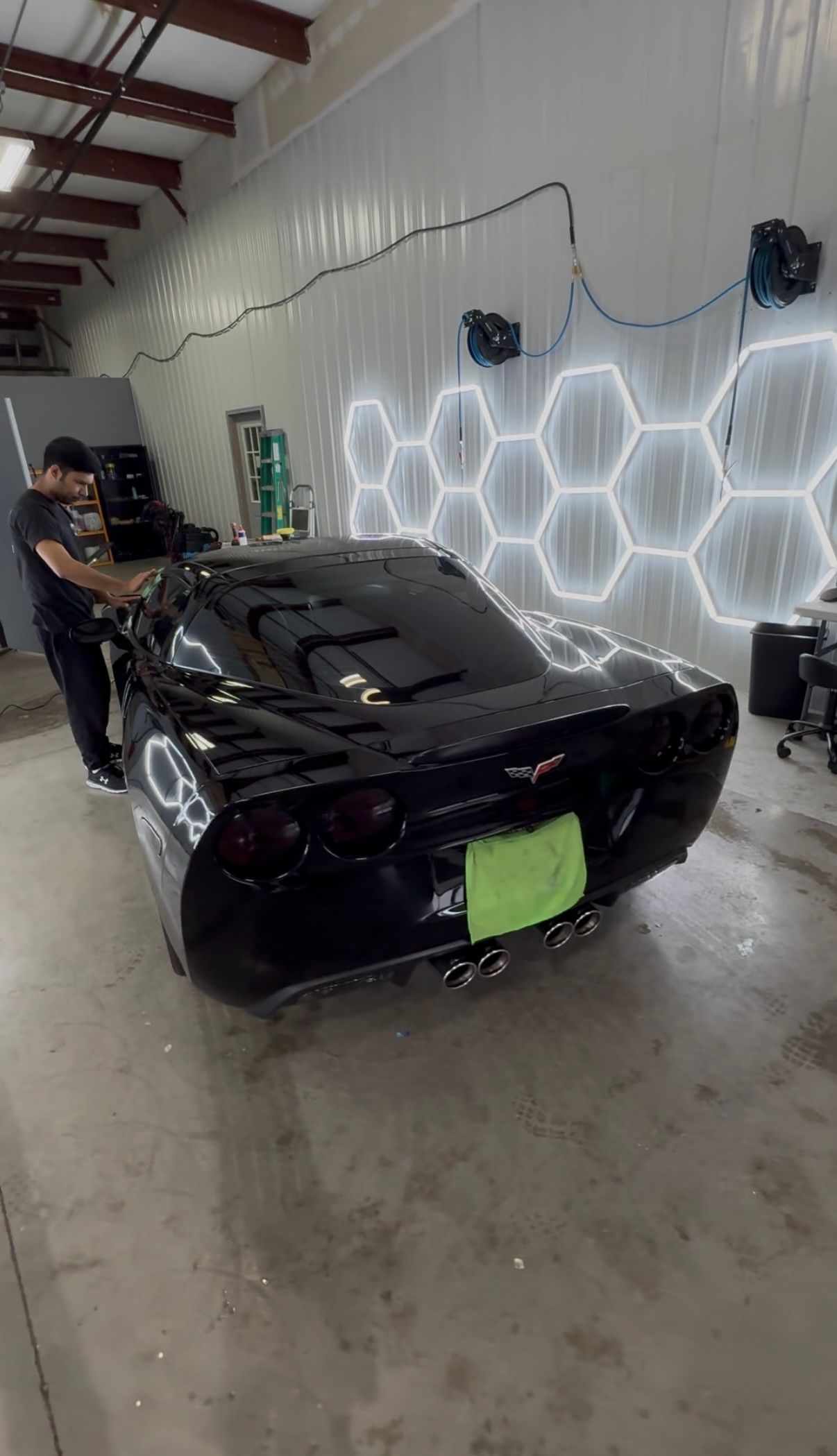 Ceramic coating applied to black car in Antioch IL by Captain Coles Detailing.